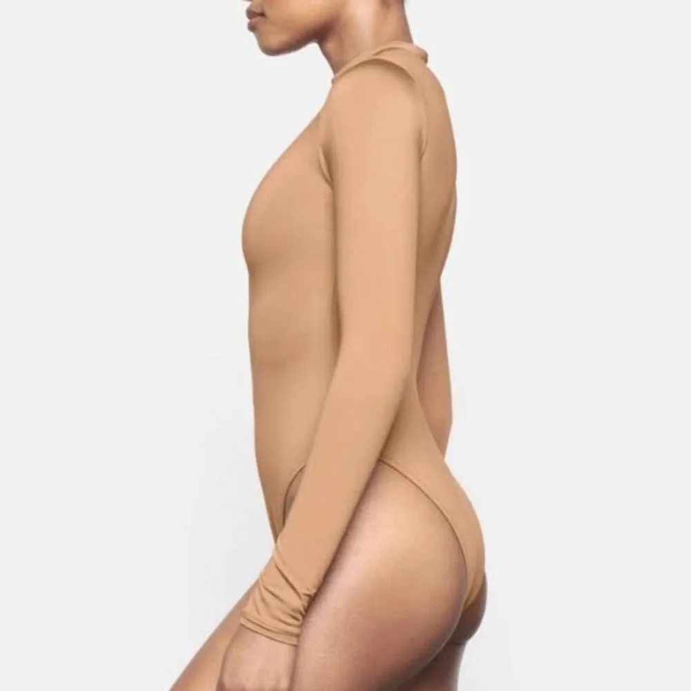 SKIMS SWIM ZIP FRONT LONG SLEEVE ONE PIECE in Ochre NEW